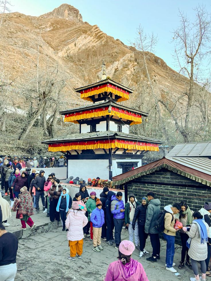 Pilgrims visiting Muktinath Temple during a pilgrimage tour in Nepal